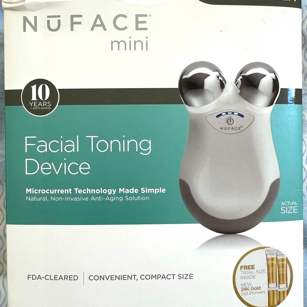 NuFace mini. Brand new. Opened but never used.